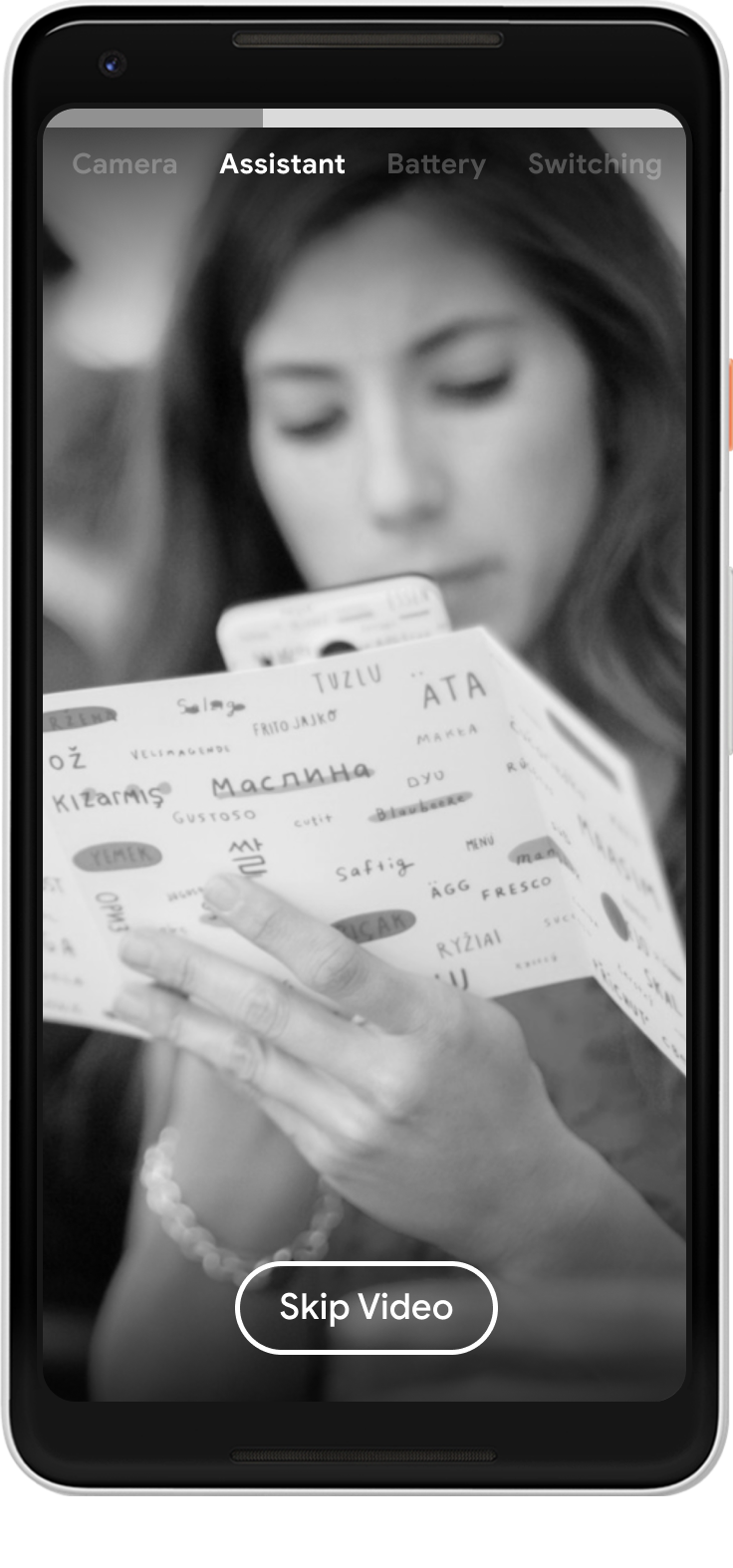 Start of the Assistant video, with a woman scanning a multi-language brochure with her phone