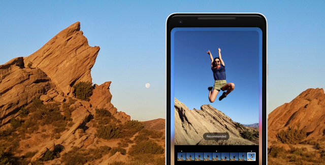 Pixel 3 with Alternate Moments UI video on screen. Pixel 3 set atop a landscape photo matching the landscape in the UI video.